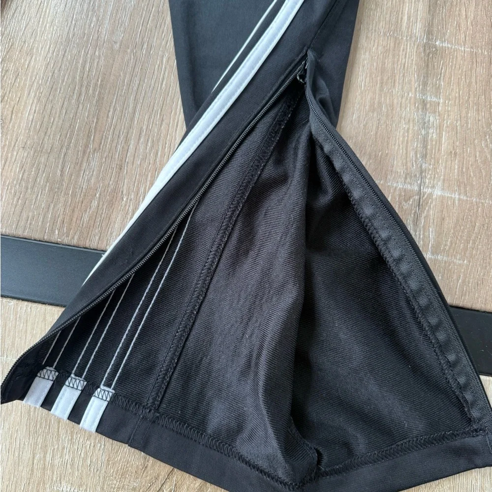 Adidas Black track pants with White Side Stripes‎
